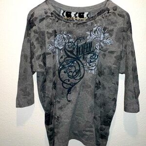 Size M Sinful shirt with black lace open back